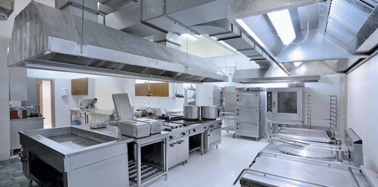 a picture of a commercial kitchen that has food grade PVC wall panels