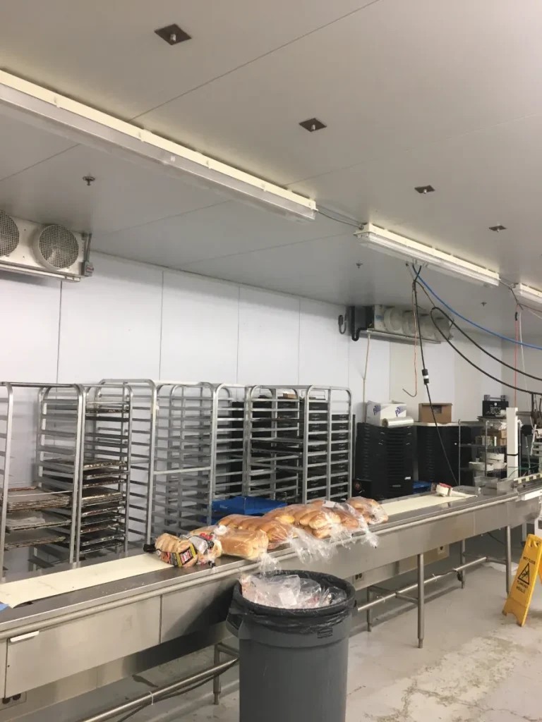 Loaves of bread in a bakery made with food-safe wall panels